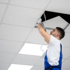 installing-white-ceiling-tiles-600x400
